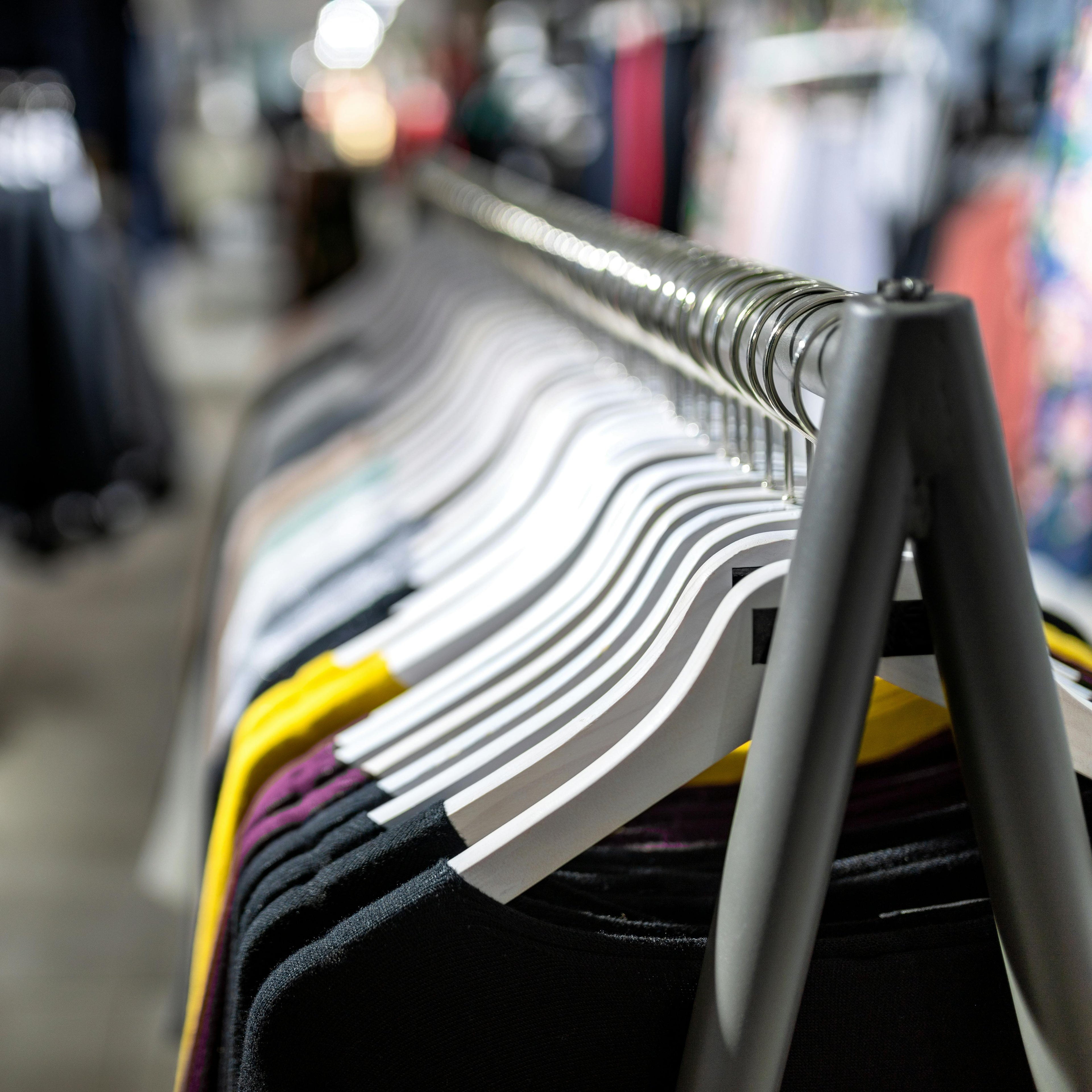 Clothing rack with hangers in a store setting